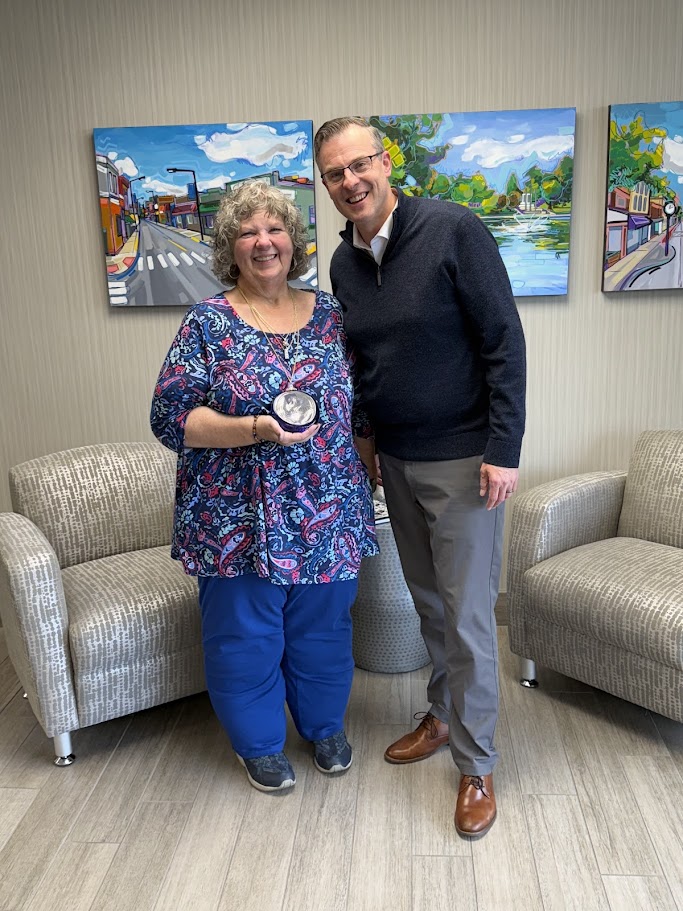 Sue Cianciola stands with Josh Gordon